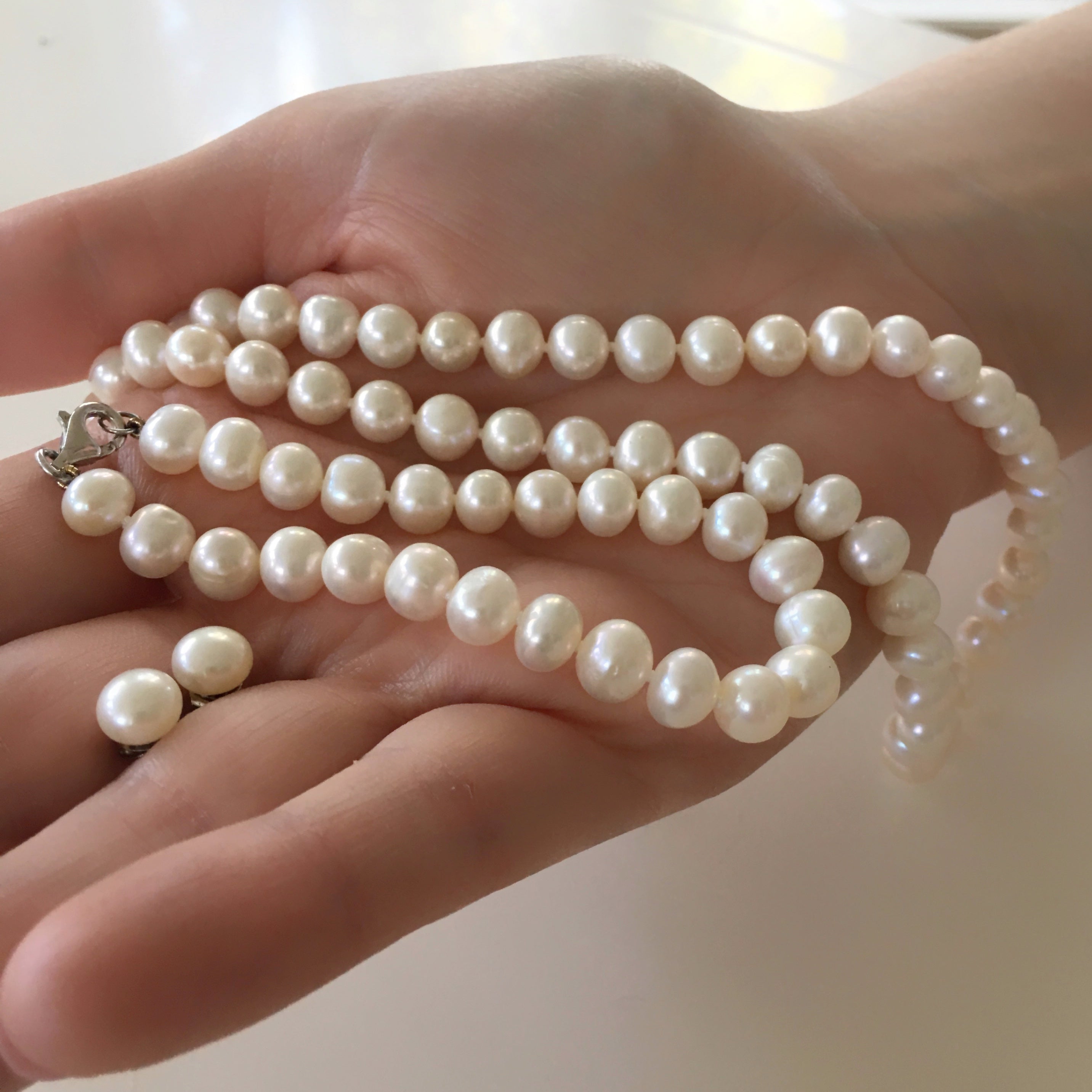 Beautiful set of pearls, including Sterling Silver stud earrings, pearl bracelet and pearl necklace