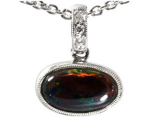 Solid black opal and diamond pendant