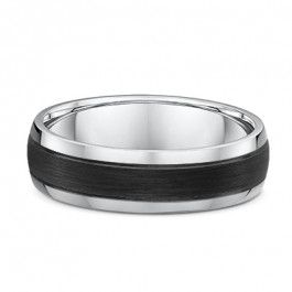 Dora 9ct White Gold and CarbonFiber mens wedding ring. Carbon fiber rings as well as being a beautiful black colour are lightweight yet strong and durable and will not chip or break if dropped unlike ceramic or other brittle rings.
Carbon fiber rings are hypoallergenic and conflict free.
An extra bonus is any scratches can be sanded out. -A13989